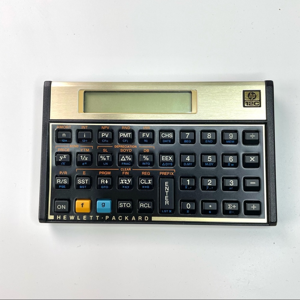 1982 Hewlett-Packard HP-12C Financial Calculator with Manual